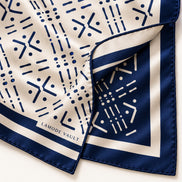Double-sided print detail of Lamode Vault Midnight Navy 100% silk scarf